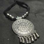Inspired by classic Indian tribal & Santiniketan art, this necklace adds a bold and cultural touch to your outfit.