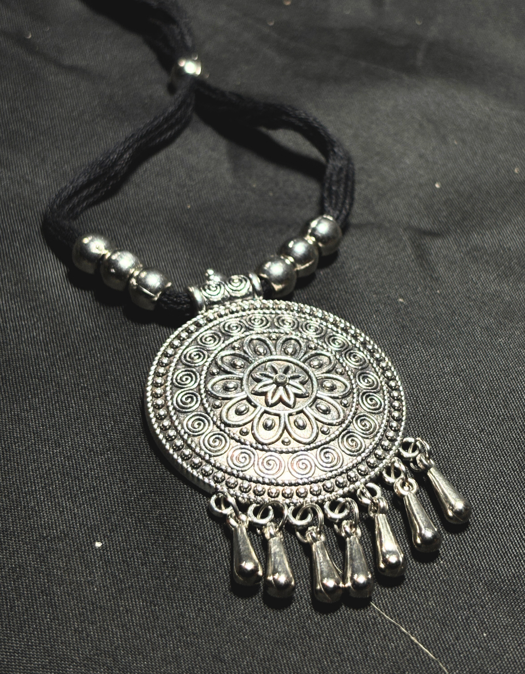 Inspired by classic Indian tribal & Santiniketan art, this necklace adds a bold and cultural touch to your outfit.