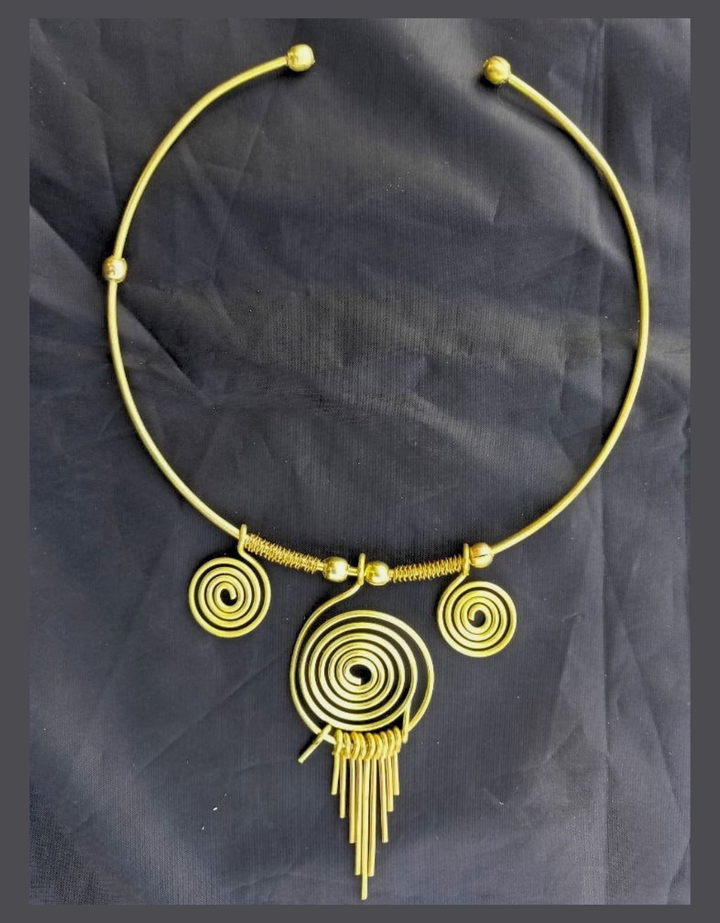 Handcrafted Dhokra Antique Brass Hasli Choker with Triple Concentric Spiral Pendant